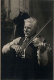 Michael J. Dunn playing fiddle